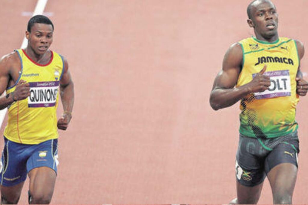 Álex Quiñónez y Usain Bolt. 