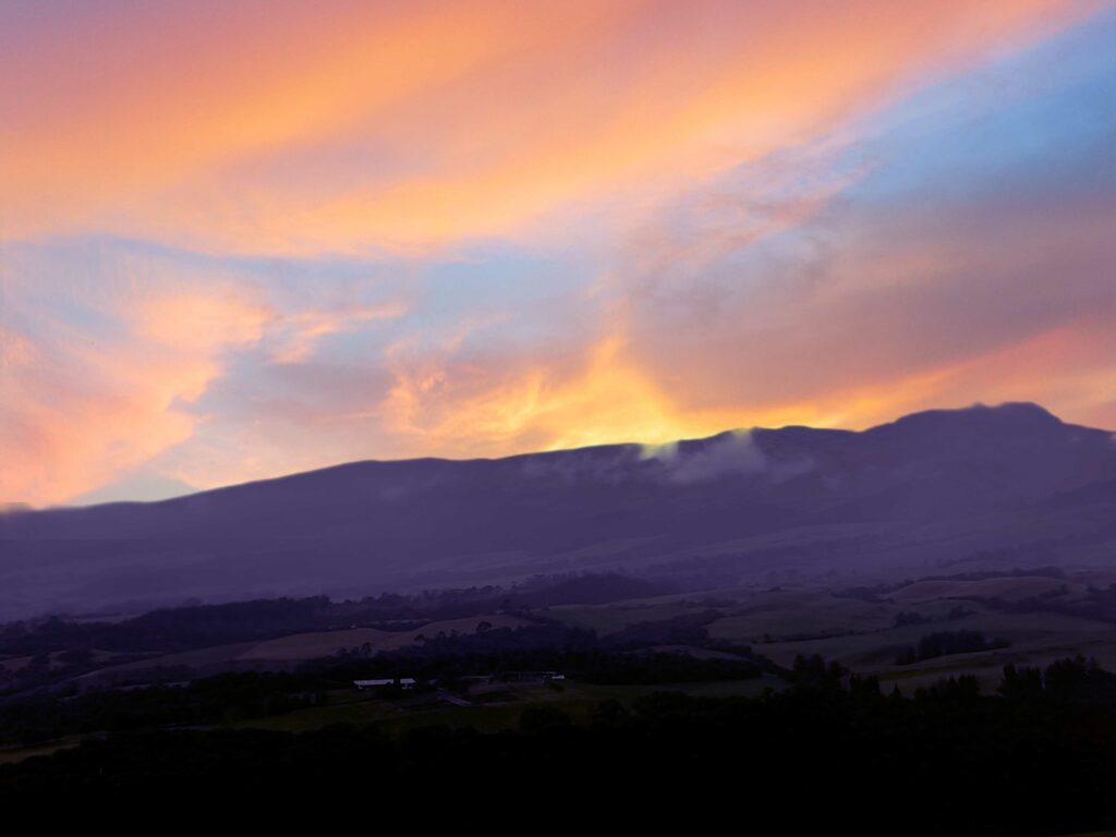 Foto de un paisaje lluvioso tras ser editada con las funciones de IA del Xiaomi Redmi 14 Pro hacia un atardecer.