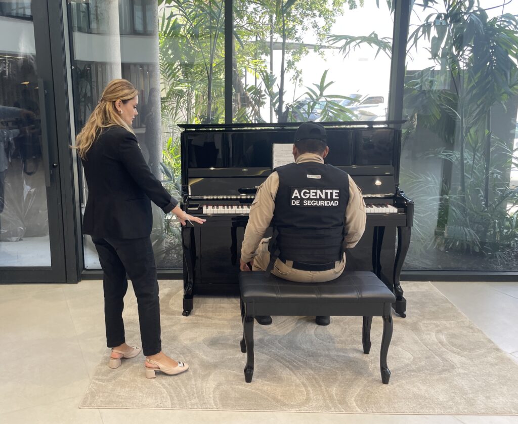 Security Guard Who Went Viral Playing Piano Receives Full Scholarship